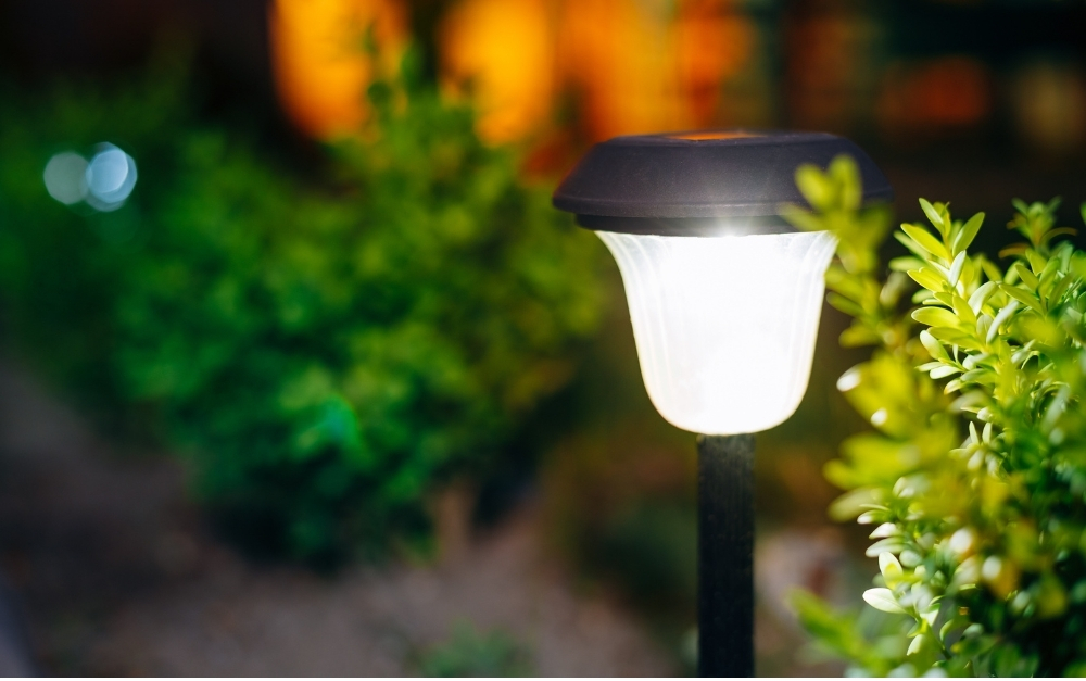 Stunning permanent outdoor lighting highlighting a luxury residential facade and landscape design in Bucks County, PA
