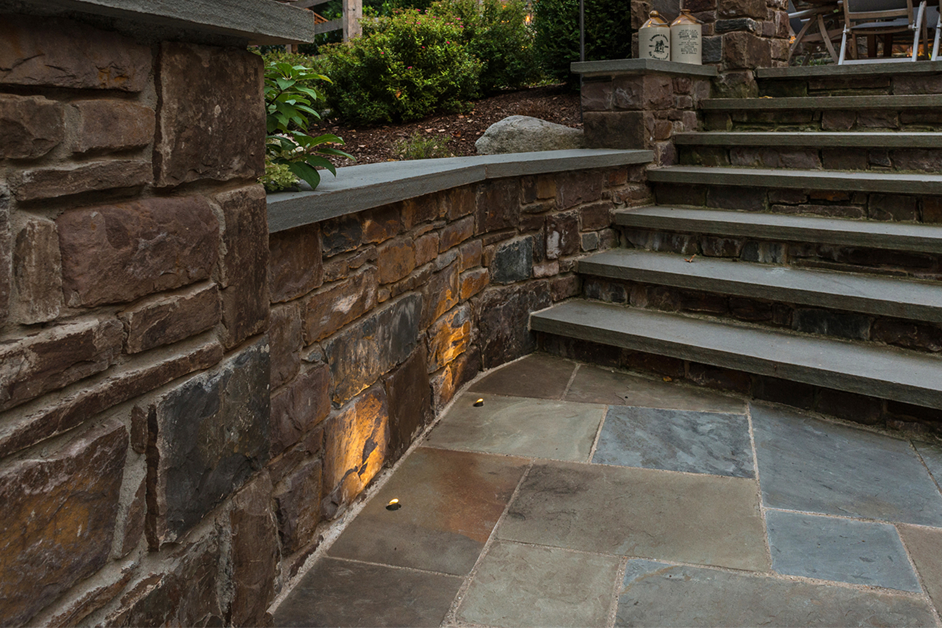 Low-voltage in-grade well light installed in a Doylestown backyard